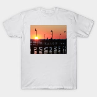 Two fishermen sillouhetted on the pier at sunrise T-Shirt